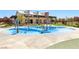 Community splash pad with water features for summer fun at 8724 Scalpay St, Las Vegas, NV 89166