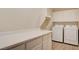 Laundry room features a storage counter, cabinets, and a washer and dryer set at 9215 Penn Station St, Las Vegas, NV 89123