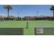 Well-maintained tennis courts in a Gathering community offer space for recreation and exercise at 9215 Penn Station St, Las Vegas, NV 89123