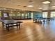 Spacious community center featuring ping pong tables, laminate flooring and natural lighting at 9409 January Dr, Las Vegas, NV 89134