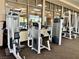 Well-equipped fitness center offering various Life Fitness machines and floor-to-ceiling windows at 9409 January Dr, Las Vegas, NV 89134