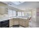 Bright kitchen featuring bright cabinets and a breakfast nook with bright windows at 9409 January Dr, Las Vegas, NV 89134