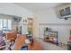 Cozy home office featuring wood desk, shelving, and television, perfect for remote work and organization at 9409 January Dr, Las Vegas, NV 89134