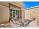 Cozy outdoor patio featuring comfortable seating, perfect for relaxing and enjoying the desert scenery at 9409 January Dr, Las Vegas, NV 89134