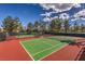 Outdoor tennis courts available for residents and guests with lush landscaping and green fencing at 9409 January Dr, Las Vegas, NV 89134