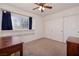 Spacious bedroom features built-in shelves, ample closet space, and neutral carpet at 9516 Belgate Ct, Las Vegas, NV 89129