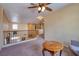 Upper-level hallway features wood banister and an overlook to the living room at 9516 Belgate Ct, Las Vegas, NV 89129