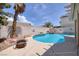 Private backyard features a sparkling pool, spa, and a relaxing outdoor space at 9516 Belgate Ct, Las Vegas, NV 89129