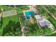 Community recreation area featuring a swimming pool, basketball court, and playground at 9705 Cameo Rose Ln, Las Vegas, NV 89134