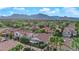 Picturesque mountain view from above a lush green residential neighborhood at 9705 Cameo Rose Ln, Las Vegas, NV 89134