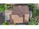 Birds eye view of a tile roofed home with backyard oasis at 9705 Cameo Rose Ln, Las Vegas, NV 89134
