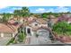 Beautiful home with a tile roof, mature landscaping, and a three car garage at 9705 Cameo Rose Ln, Las Vegas, NV 89134