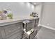 Close-up of custom kitchen cabinetry with ample storage and a built-in beverage cooler at 9705 Cameo Rose Ln, Las Vegas, NV 89134