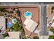Aerial view of a single Gathering home with a swimming pool and drought-tolerant landscaping at 10290 Marion Morrison Ct, Las Vegas, NV 89183