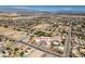 Expansive aerial view of the neighborhood, showcasing the community layout and proximity to the Las Vegas skyline at 10290 Marion Morrison Ct, Las Vegas, NV 89183