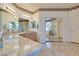 Bathroom showcasing granite countertops, decorative lighting, and a walk-in shower at 10290 Marion Morrison Ct, Las Vegas, NV 89183