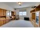Spacious bedroom showcasing custom built-in shelves and cabinetry offering ample storage and display space at 10290 Marion Morrison Ct, Las Vegas, NV 89183