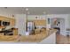Kitchen featuring stainless steel appliances, granite counters, casual dining area, and natural light streaming in from the patio at 10290 Marion Morrison Ct, Las Vegas, NV 89183