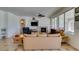 Bright living room with fireplace and backyard views at 10290 Marion Morrison Ct, Las Vegas, NV 89183