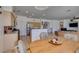 Open-concept living space features kitchen, dining, and living room at 10290 Marion Morrison Ct, Las Vegas, NV 89183