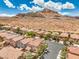 A lovely neighborhood with picturesque houses and gorgeous mountain views in a desert setting at 10294 Running Falls St, Las Vegas, NV 89178