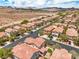 Breathtaking aerial image presenting a community surrounded by desert landscape and majestic mountain backdrop at 10294 Running Falls St, Las Vegas, NV 89178