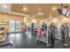 A spacious workout room with a variety of exercise equipment for a complete fitness experience at 10294 Running Falls St, Las Vegas, NV 89178