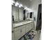 Bright bathroom with a dual vanity and modern fixtures at 11318 San Arezzo Pl, Las Vegas, NV 89141