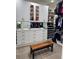 Custom closet with built-in shelving, drawers, and a dressing area at 11318 San Arezzo Pl, Las Vegas, NV 89141
