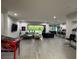 Open-concept living room with entertainment area and seamless indoor-outdoor flow at 11318 San Arezzo Pl, Las Vegas, NV 89141
