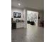 Bright, spacious living space with bar, wine fridge, and stylish decor at 11318 San Arezzo Pl, Las Vegas, NV 89141