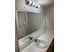 Bathroom vanity featuring a white countertop, mirror, and vanity lighting at 1150 N Buffalo Dr # 2093, Las Vegas, NV 89128