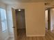 Bedroom closet and hallway access featuring wood-look floors and shelving at 1150 N Buffalo Dr # 2093, Las Vegas, NV 89128