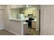 Bright kitchen with a full suite of appliances and light wood cabinets at 1150 N Buffalo Dr # 2093, Las Vegas, NV 89128