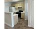 Functional kitchen with appliances and light wood cabinetry at 1150 N Buffalo Dr # 2093, Las Vegas, NV 89128