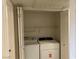 Convenient laundry closet equipped with a washer and dryer for in-unit laundry at 1150 N Buffalo Dr # 2093, Las Vegas, NV 89128