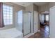 This well-lit bathroom showcases a separate shower and bathtub at 11698 Firesteed Pl, Las Vegas, NV 89141