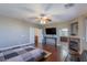 Large main bedroom featuring fireplace, TV and ensuite bathroom access at 11698 Firesteed Pl, Las Vegas, NV 89141