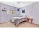 Calm bedroom featuring a ceiling fan and a serene, light purple paint at 11919 Jersey Lilly St, Las Vegas, NV 89183