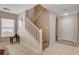 Welcoming entryway with staircase and neutral color palette at 11919 Jersey Lilly St, Las Vegas, NV 89183