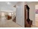 Hallway featuring a staircase, storage, and access to other areas of the home at 11919 Jersey Lilly St, Las Vegas, NV 89183