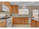 Functional kitchen design with gas range, tile backsplash and ample counter space at 11919 Jersey Lilly St, Las Vegas, NV 89183