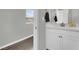 Bathroom with a white vanity, countertop, and a mirror at 12341 Ferry Glide Ave, Las Vegas, NV 89138