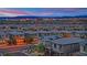 This home offers a panoramic city view showcasing the vibrant lights of the city skyline at 12341 Ferry Glide Ave, Las Vegas, NV 89138