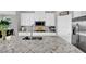 Modern kitchen with white cabinets, granite countertops, stainless steel appliances, and a large island at 12341 Ferry Glide Ave, Las Vegas, NV 89138