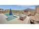 A cozy pool with a sun-lounging area, perfect for relaxation and entertainment at 12341 Ferry Glide Ave, Las Vegas, NV 89138