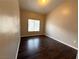 Guest bedroom with hardwood floors and a bright window at 1881 W Alexander Rd # 1035, North Las Vegas, NV 89032