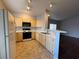 A well-lit kitchen equipped with laminate countertops and white appliances at 1881 W Alexander Rd # 1035, North Las Vegas, NV 89032