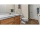 Bathroom with vanity, toilet, and a glass-enclosed shower featuring clean lines and modern design, perfect for relaxation at 2024 Spruce Brook Dr, Henderson, NV 89074