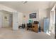 Versatile bonus room featuring a built-in desk, file cabinets, and a neutral color palette to enhance productivity at 2024 Spruce Brook Dr, Henderson, NV 89074